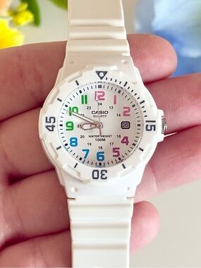 Vibrant Multi-Coloured Casio Day/Date Ladies Watch 100M WR White Retro Timepiece
